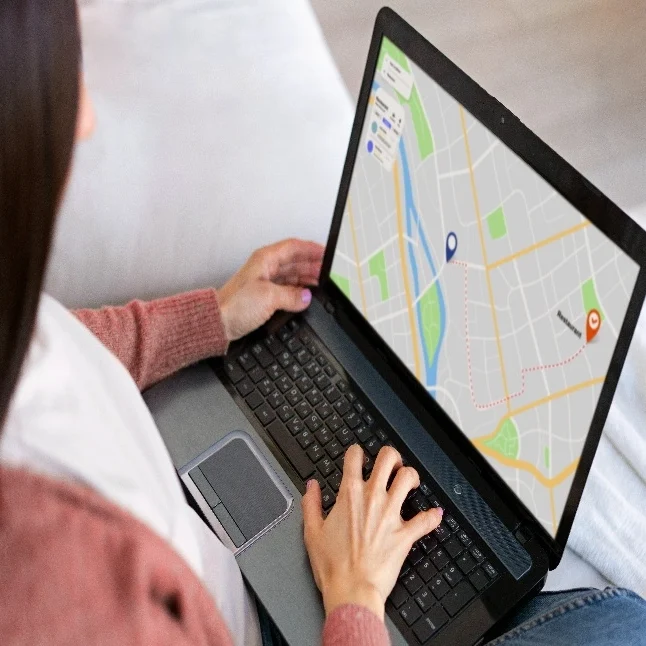 School & College Transport GPS Tracking Solutions in India SPLAKDHN GPS fleet monitoring on computer screen stock image